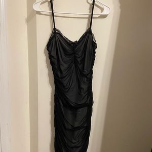 black mini dress with lace detailing on neckline and bow!!